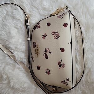 #25. Coach crossbody bag